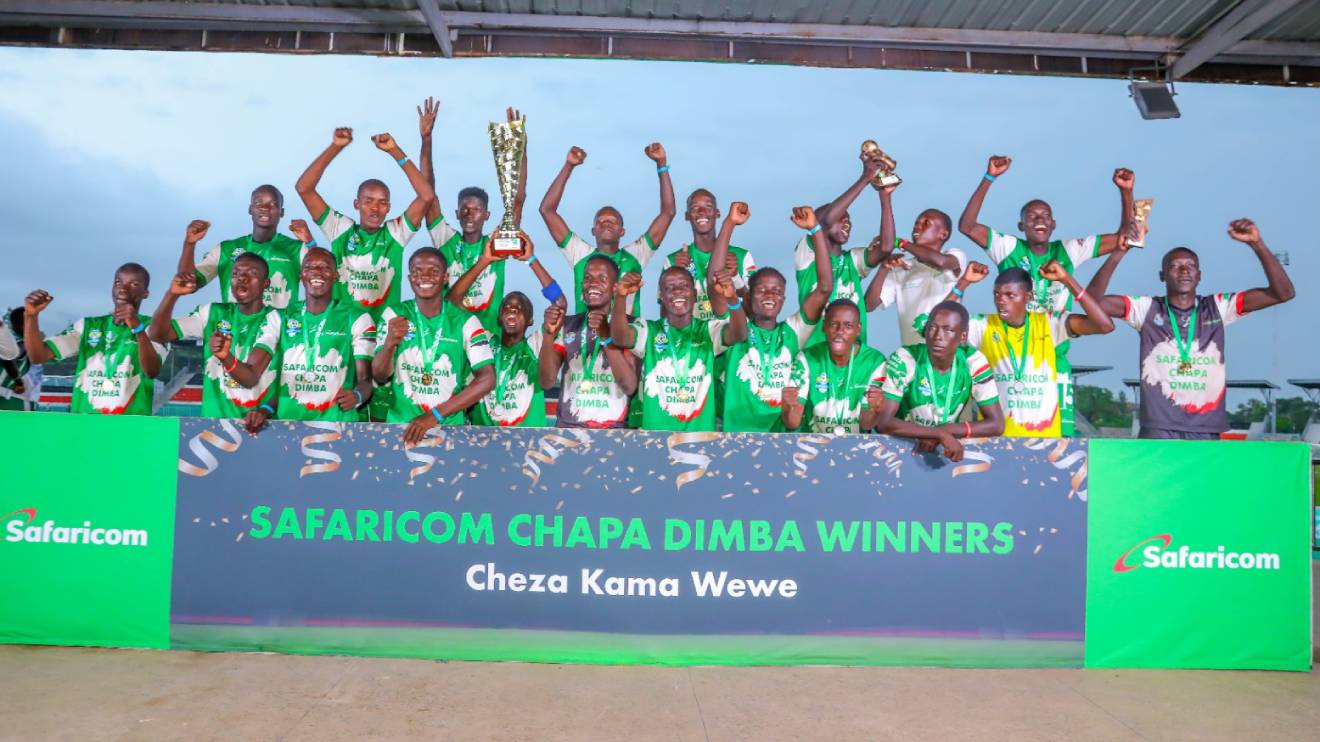 Obunga FC from Kisumu County celebrate after winning Safaricom Chapa Dimba season four national title at Jomo Kenyatta Mamboleo stadium. PHOTO/COURTESY